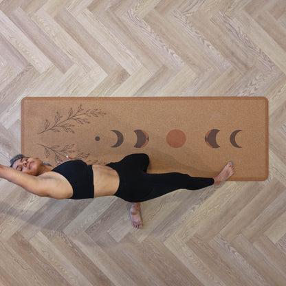 Woman practicing yoga on a Zenvibes extra wide cork yoga mat with moon phase design
